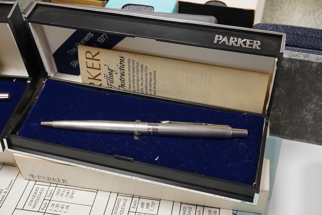 A folder of Parker and Sheaffer pens and ball pens, mostly boxed and a Parker Pen box containing eight items